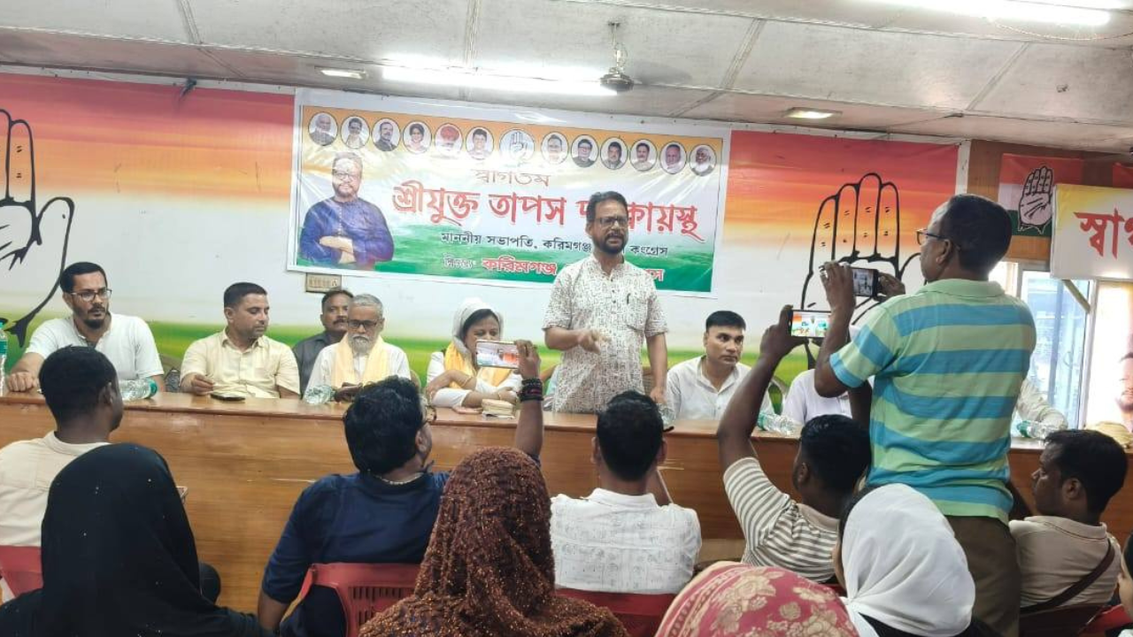 Kabir Ahmed engaging with local citizens during a community meeting.