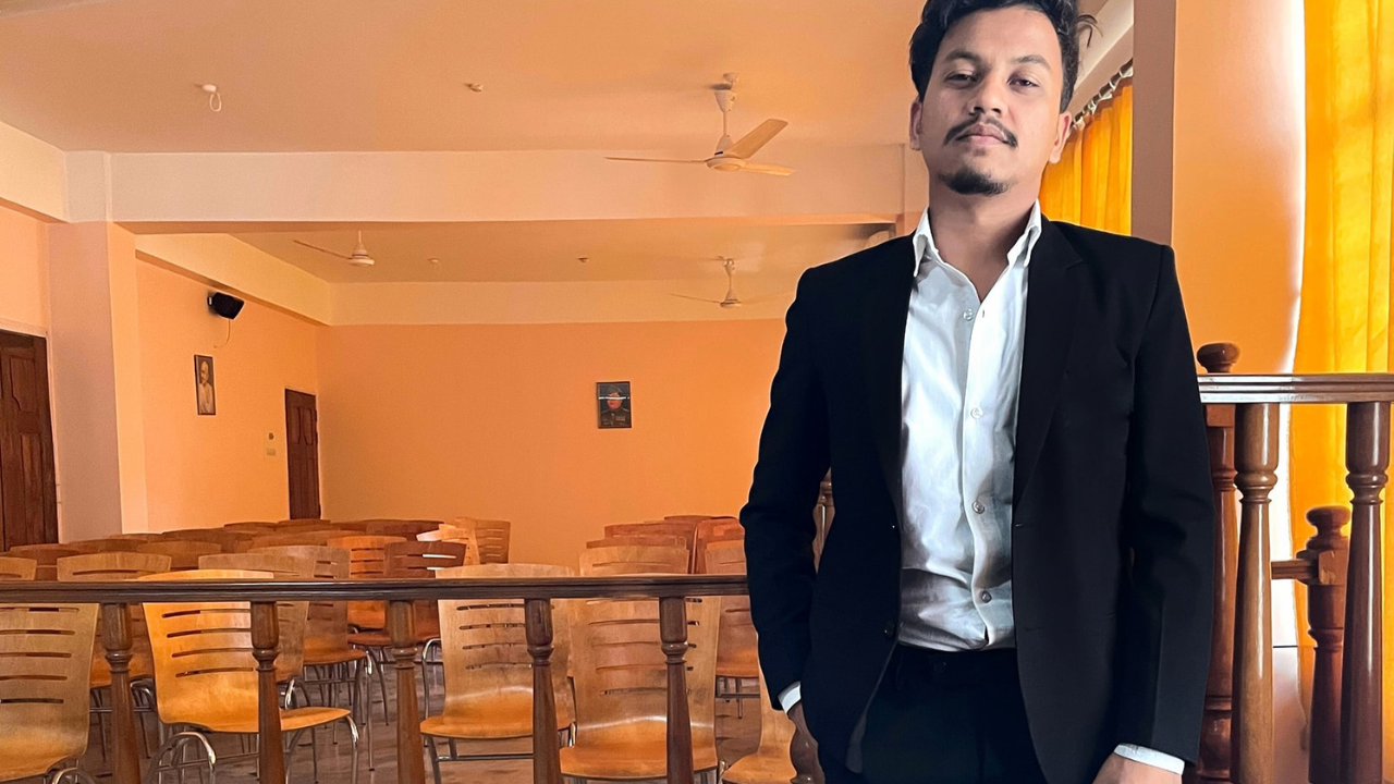 Naziz Afruz, a young lawyer from Assam, newly inducted into the Bar Council, standing outside Gauhati High Court in formal legal attire
