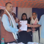 Siddique Ahmed Distributes Arunodoi Cards to Women