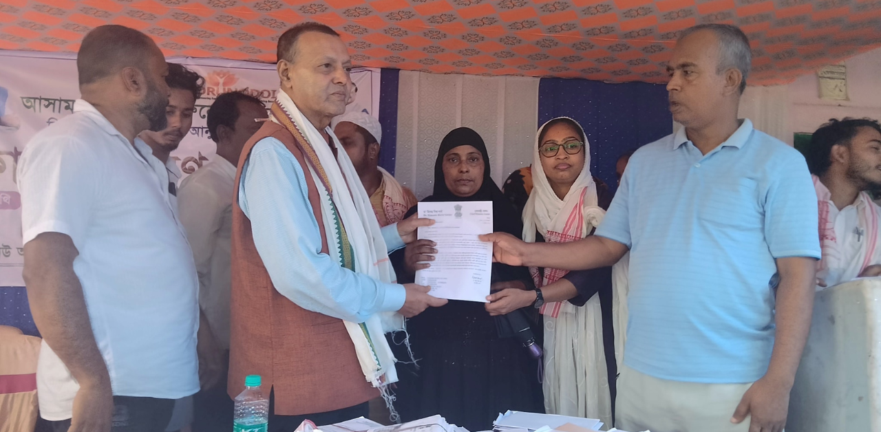 Siddique Ahmed Distributes Arunodoi Cards to Women