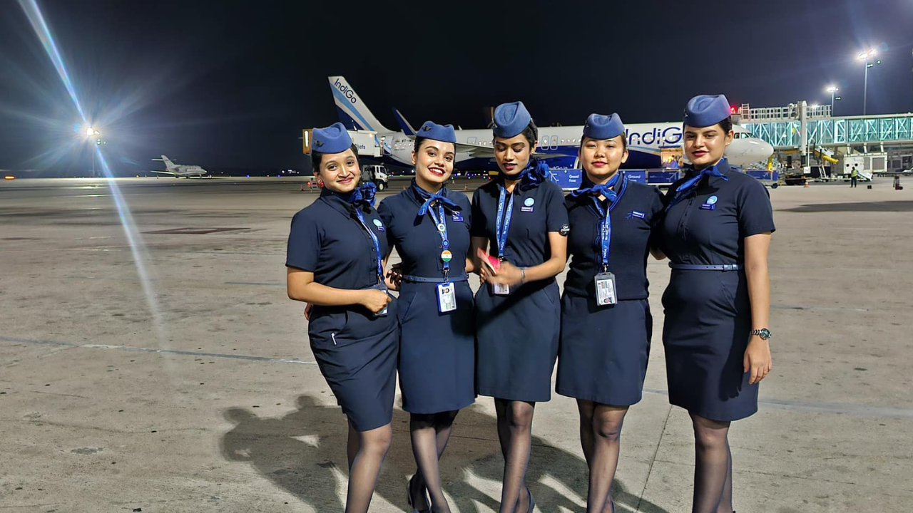 Sweta Mukherjee – IndiGo Cabin Crew in uniform posing at airport