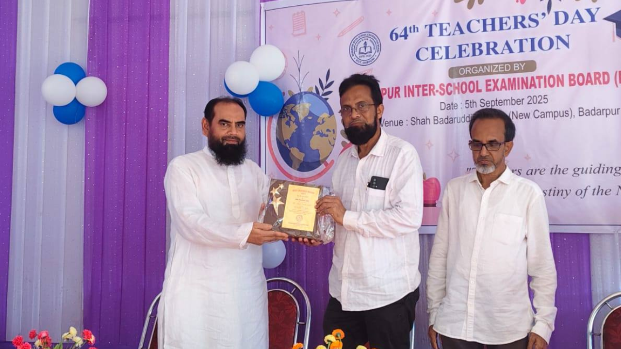 Dr. Mortuja Hussain with students of Patharkandi College