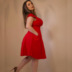 Romi Chase creating digital content for Instagram and YouTube, plus-size influencer empowering fans"